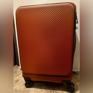 CALPAK Rust Orange Carryon suitcase